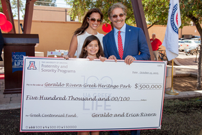 Rivera, his wife, Erica, and their daughter, Sol, with the oversize check symbolizing a $500,000 donation to build Greek Heritage Park (Photo: John de Dios/UANews) Rivera, his wife, Erica, and their daughter, Sol, with the oversize check symbolizing a $500,000 donation to build Greek Heritage Park (Photo: John de Dios/UANews)